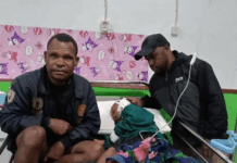 A child victim of the Indonesian military raids in Sugapa district