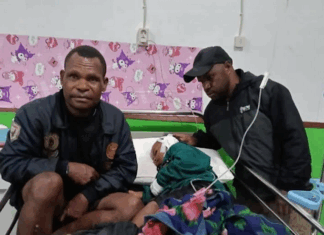 A child victim of the Indonesian military raids in Sugapa district