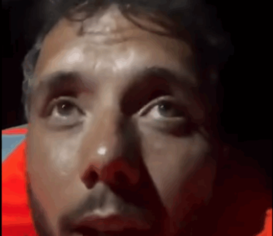 Brazilian activist Thiago Avila wearing a life jacket