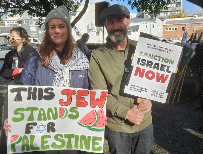 "This Jew stands for Palestine" and "Sanction Israel now"