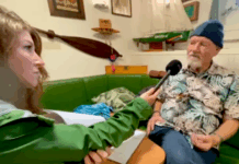 Rainbow Warrior host Niamh O'Flynn talks to author David Robie in the ship's mess as part of the virtual tour