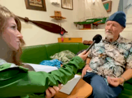 Rainbow Warrior host Niamh O'Flynn talks to author David Robie in the ship's mess as part of the virtual tour