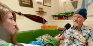 Rainbow Warrior host Niamh O'Flynn talks to author David Robie in the ship's mess as part of the virtual tour