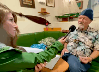 Rainbow Warrior host Niamh O'Flynn talks to author David Robie in the ship's mess as part of the virtual tour