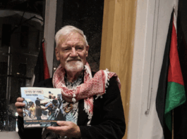 David Robie with his latest book, Eyes of Fire: Last voyage and the Legacy of the Rainbow Warrior