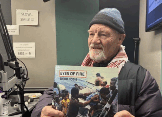 "Hot off the press" . . . David Robie talks Eyes of Fire just after receiving the first copy of his book marking 40 years since the bombing of the Rainbow Warrior on 10 July 1985