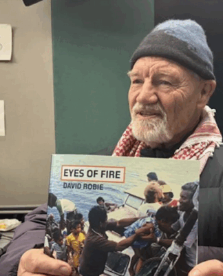 "Hot off the press" . . . David Robie talks Eyes of Fire just after receiving the first copy of his book marking 40 years since the bombing of the Rainbow Warrior on 10 July 1985