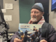 "Hot off the press" . . . David Robie talks Eyes of Fire just after receiving the first copy of his book marking 40 years since the bombing of the Rainbow Warrior on 10 July 1985