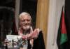 Author David Robie with his latest book, Eyes of Fire: The Last Voyage and Legacy of the Rainbow Warrior.
