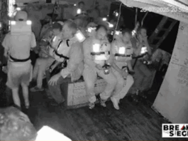 The Freedom Flotilla's Handala crew in emegency positions just before the Israeli military seizure of their humanitarian aid ship on Saturday