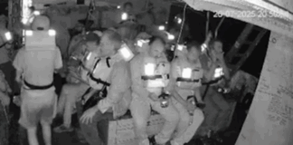 The Freedom Flotilla's Handala crew in emegency positions just before the Israeli military seizure of their humanitarian aid ship on Saturday