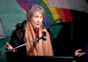 Former NZ prime minister Helen Clark speaking on the deck of the Rainbow Warrior