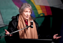 Former NZ prime minister Helen Clark speaking on the deck of the Rainbow Warrior