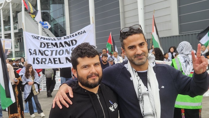 Greenpeace campaigner Juan Parada (left) and one of the Palestine rally facilitators, Youssef Sammour, at today's rally