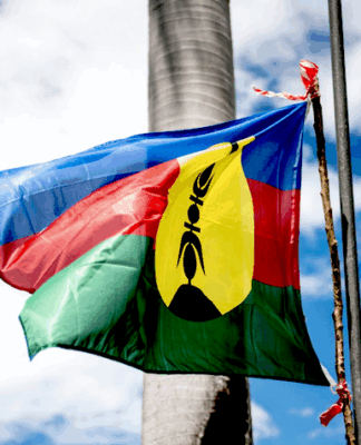 The indigenous Kanaky flag adopted in 1983 and usually flown alongside the French tricolour under the Nouméa Accord