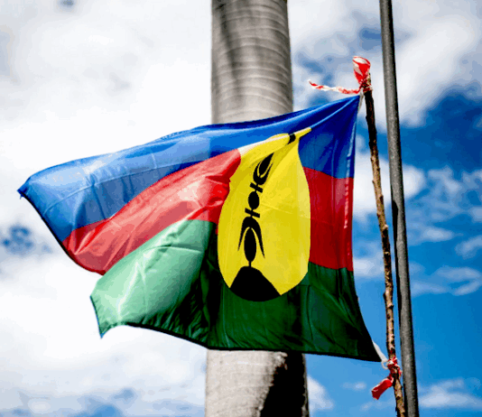 The indigenous Kanaky flag adopted in 1983 and usually flown alongside the French tricolour under the Nouméa Accord