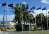 Flags from most of the Micronesian islands participating in the regional summit this week fly outside the International Conference Center