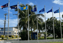 Flags from most of the Micronesian islands participating in the regional summit this week fly outside the International Conference Center