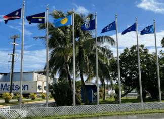 Flags from most of the Micronesian islands participating in the regional summit this week fly outside the International Conference Center