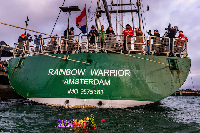 Rainbow Warrior III wreath GP 680wide Greenpeace Aotearoa held a dawn ceremony on board the Rainbow Warrior III today commemorating the 40th anniversary of the bombing of the original Rainbow Warrior and the death of photographer Fernando Pereira on 10 July 1985