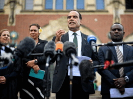 Vanuatu's Climate Minister Ralph Regenvanu talks to the media