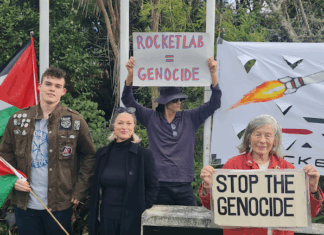 Protesters picketing a Rocket Lab manufacturing site in Warkworth