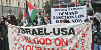 An "Israel-USA - blood on your hands" banner at a pro-Palestinian rally in Auckland last Saturday
