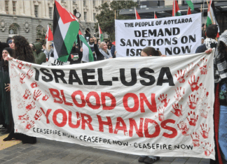 An "Israel-USA - blood on your hands" banner at a pro-Palestinian rally in Auckland last Saturday