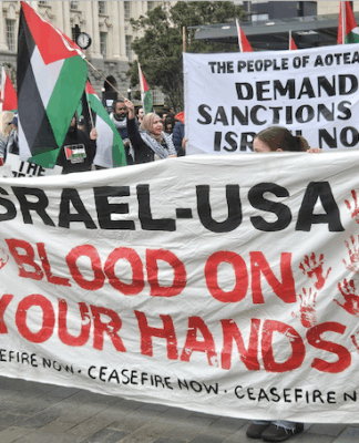 An "Israel-USA - blood on your hands" banner at a pro-Palestinian rally in Auckland last Saturday