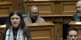 NZ Green Party co-leader Chlöe Swarbrick with three of her party colleagues all wearing Palestinian keffiyeh