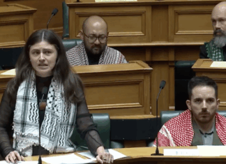 NZ Green Party co-leader Chlöe Swarbrick with three of her party colleagues all wearing Palestinian keffiyeh