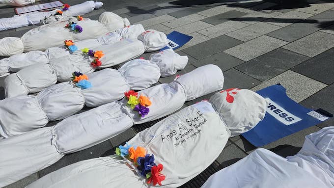 Some of the mock bodies today representing the slaughtered Gazan journalists with Al Jazeera's Anas al-Sharif in the forefront