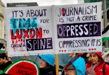A demonstration placard last weekend against Prime Minister Christopher Luxon's weakness over Palestine and condemning Israeli oppression against Gazan journalists