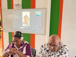 Laurie Humuni (RDO), spokesperson for the FLNKS political bureau (left) and UC's secretary-general Dominque Fochi