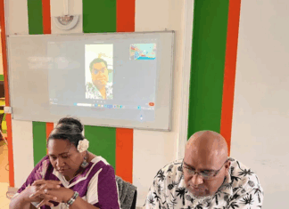 Laurie Humuni (RDO), spokesperson for the FLNKS political bureau (left) and UC's secretary-general Dominque Fochi