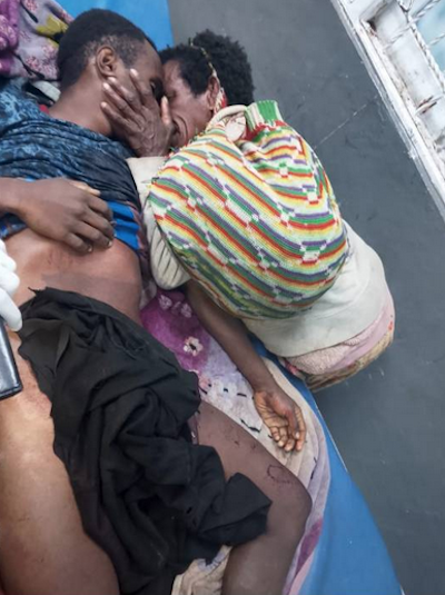 A mother farewells her son in West Papua