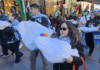 New Zealand protesters carry symbolic "bodies" of Palestinian journalists slaughtered by the Israeli military