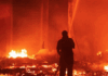Marshall Islands firefighters try to contain the Nitijela (Parliament) fire