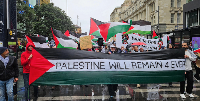 A "Palestine forever" banner at the head of the Auckland march 