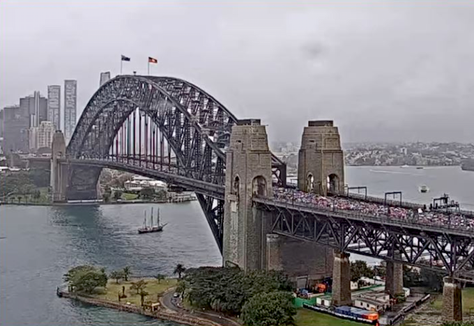 Thousands of protesters cross the Sydney Harbour Bridge today in support of Palestine