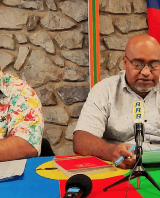 Two of New Caledonia’s pro-independence Union Calédonienne leaders Emmanuel Tjibaou (left) and Dominique Fochi holding a press conference in Nouméa