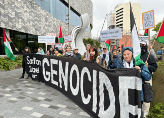 Protesters accusing Rocket Lab and the New Zealand government of being complicit in Israel's genocide in Gaza