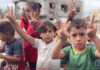 Palestinian children celebrate news of the Gaza ceasefire