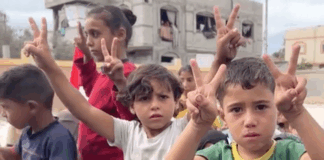 Palestinian children celebrate news of the Gaza ceasefire
