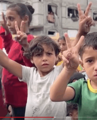 Palestinian children celebrate news of the Gaza ceasefire