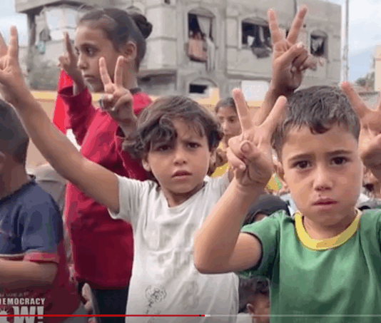 Palestinian children celebrate news of the Gaza ceasefire