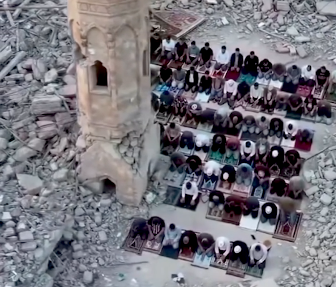 Gaza prayers YeniSafak 680wide Palestinians perform prayer next to the rubble of a mosque that was destroyed by the Israeli occupation forces during the Gaza genocide