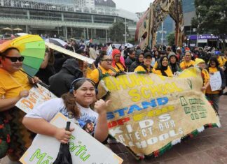 Thousands march through streets as part of NZ’s ‘mega strike’ Teachers from Otahuhu Primary School among the thousands at today's "mega strike" rally
