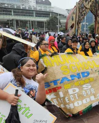 Thousands march through streets as part of NZ’s ‘mega strike’ Teachers from Otahuhu Primary School among the thousands at today's "mega strike" rally