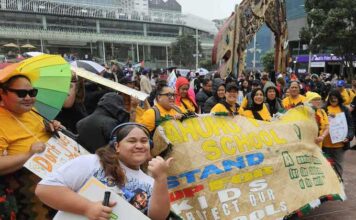 Thousands march through streets as part of NZ’s ‘mega strike’ Teachers from Otahuhu Primary School among the thousands at today's "mega strike" rally